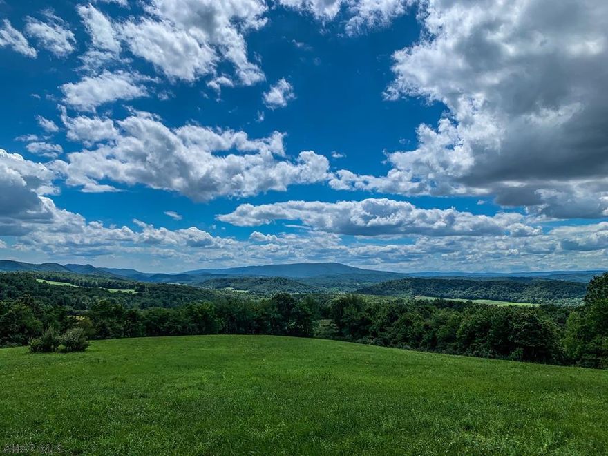 62.89 acres of open and wooded land with spectacular views. Three separate but contiguous parcels. Each was perc approved for a private septic and one lot had a drilled well. Comp purposes only.