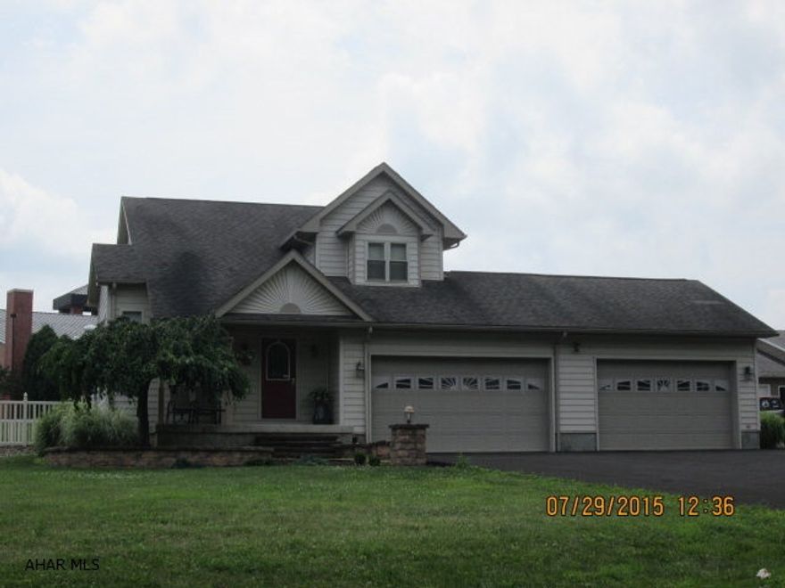 Large covered back deck with adjoining fenced inground pool. Have an RV, boat or car collection there is a large detached 20X40 garagewith 12ft door besides the 3 car attached garage. Basement is finished family room.  This home is in front of the Claysburg Kimmel Elementary School. This is a must see.