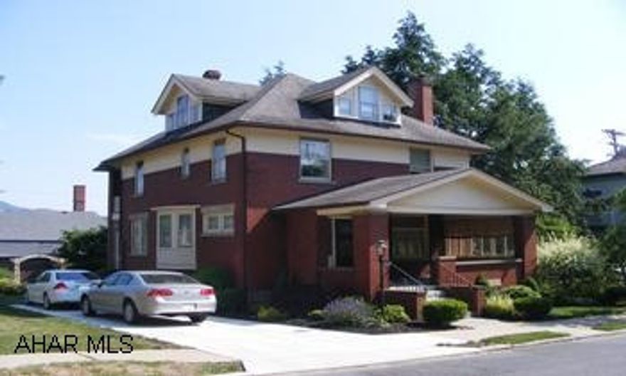 A Classic Boro Beauty! Lovely 4 bedroom, 2.5 bath Brick with marble fireplace, formal dining room, family room, hardwoods, corner cabinet and built in bookcases. Crown molding throughout and unique baths. New heating system and concrete driveway. 2nd floor balcony off one of the bedrooms. 3rd floor is finished and heated .Lovely flower gardens & landscpaed yard. Must see to appreciate all the original features. Call John Stultz 329-1856.