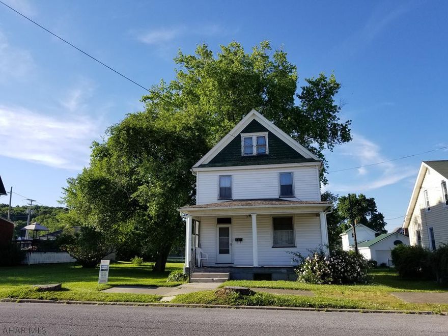 Historic diamond in the rough perfect for the creative handyman!  This home offers so much original character and just needs to be brought back to life.  Most rooms have the original hardwood flooring and trim.  The home sits on a huge quarter acre lot!
