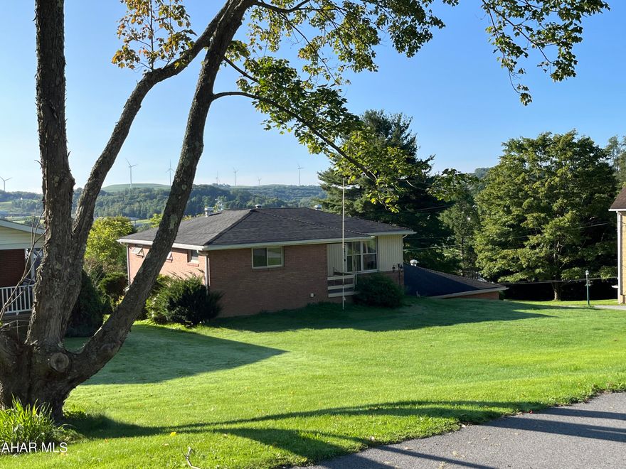 This is a homey ranch house in Hastings on a corner lot. This house has an integral 2 car garage and off street parking. Brick and vinyl exterior. The main floor features an eat in kitchen, living room, full bath and three bedrooms. The basement has a finished rec room and 1/2 bath. There is access to the integral garage and a walk out entry to a patio for relaxation. Age of the home is estimated This is a great opportunity for one story living in Hastings. Move right  in and make this house your home.