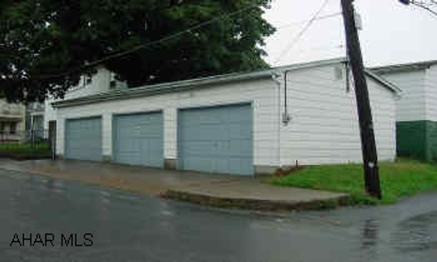 GREAT 20X40' 3 BAY GARAGE ON A CORNER LOT.  ZONED RESIDENTIAL, BUT COULD GET VARIANCE. NEW ELECTRIC - 100 AMP SERVICE!  CEMENT FLOORS AND 1 AUTO OPENER.  GOOD FOR STORAGE, HOBBYIST, OR PROFESSIONAL.  CALL MIKE MANGIA.