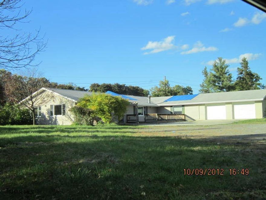 This Logan Twp property has loads of possibilities with 2 acres of ground located near Penn State Altoona Campus.