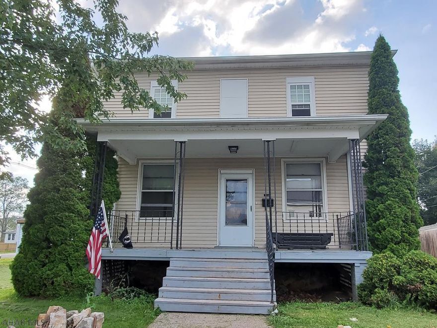 Spacious 4 bedroom 1 bath home with 2 garages on a corner lot! The 2 bay garage is on a separate parcel  (5.00-01..-109.00-000)   and currently being rented for $270 mo with a long term month to month tenant. This is a unique opportunity and could help pay your mortgage! Preapproved buyers only. Buyer to confirmed taxes,  sq footage and lot size.