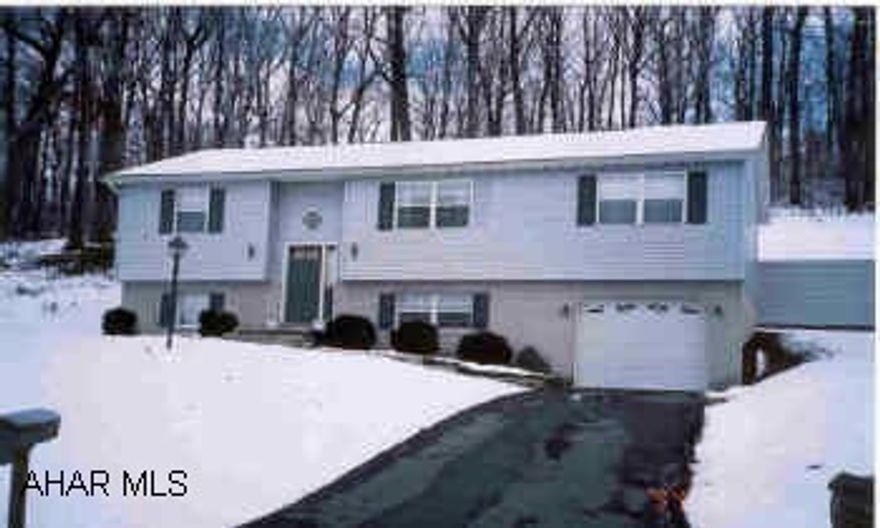 8 yr old bi-level.  Kit., dining room, living room, 3 brms, 2.5 baths.  Full finished basement, 1 garage stall. Extremely clean 8 year old home.  Move in condition, comes with ref., stove, all window coverings, washer and dryer.