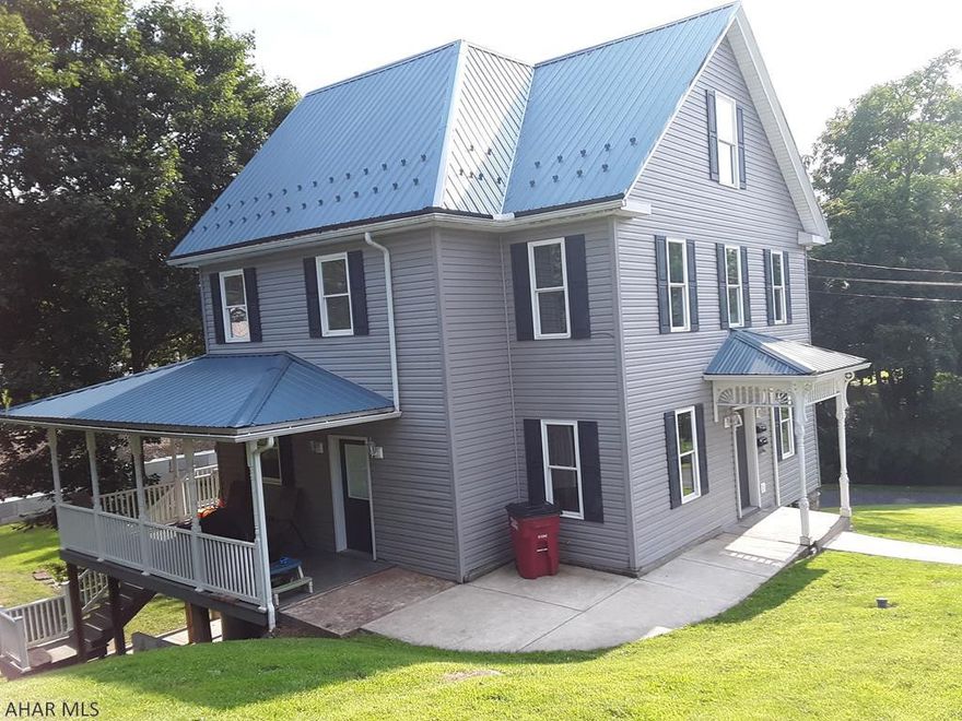 Completely remodeled 4-bedroom house with full bath on 1-st floor and full bath on 2-nd floor.  New roof, windows and siding!  All appliances included (2 gas stoves, dishwashers, 2 microwaves, 2 refrigerators).  Washer and dryer hook up.  Heat pump with A.C.  Large attic!  2 blocks form Tussey Mountain High School, 5  minutes form Weaver's boat launch, Raystown Lake.  Great fishing locations and nice for hunting.  This would make a great vacation home with 4 bedrooms and a 2 bedroom lower floor apartment for guests or a great rental opportunity.  This house is a must see!  Close to town with a Dollar General, Grocery store, and pizza shop within walking distance.