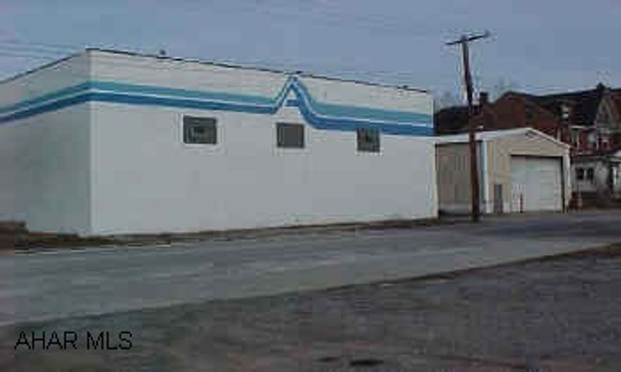 10,588 sq. ft. total includes 3155 sq. ft. with 17 ft. ceiling, 4607 sq. ft. with 12' ceiling, 1135 s1. ft. office and a 1710 sq. ft. separate metal building.  At grade access and dock access. Extra lots for parking.  Property is also available for lease at $2300 per month.  Just off Rt. 36 at the intersection of Union Avenue, 24th Street and 8th Avenue.