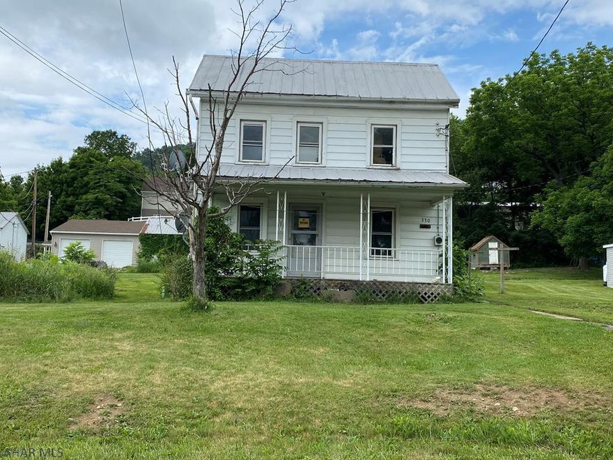 Looking for a good place to start, it's your call. You can either fix it up or start over. Public water & sewer, electric and road permit already established. Nice open 0.414 acre lot.