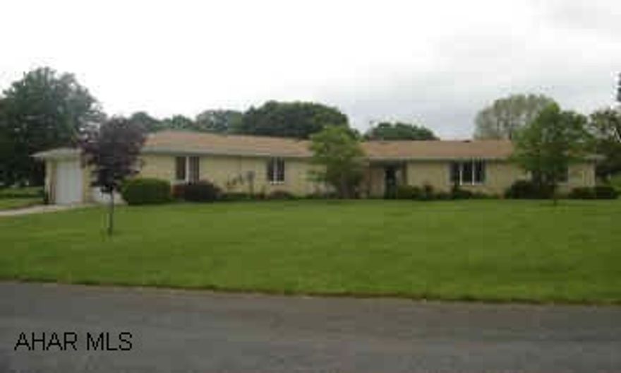 3 Bedroom brick ranch on double level lot in Pleasantville.  Property includes 2 car attached high bay garage, brick hearthed wood stove, and new appliances.