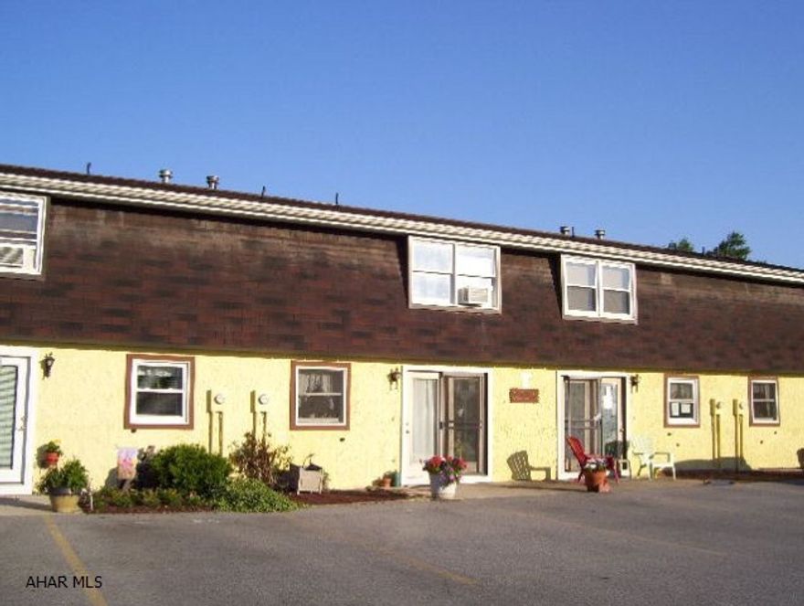 Beautiful grounds with quiet country feeling at Maple Hollow Townhouses. Sparkling 2 bedroom, 1.5 bath low cost living is possible. Homeowners Association fee $145.00/month.