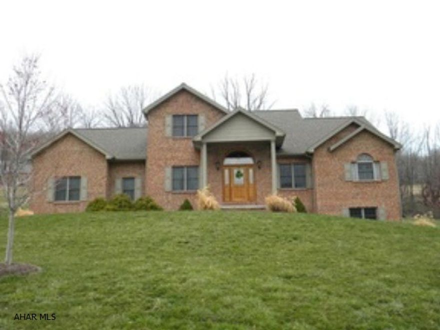 REDUCED!! NOW PRICED BELOW APPRAISAL!!!! Inspections already done (saving your buyer $$)  Very spacious and lovely 2 story Brick/vinyl home offers 4BR, 4.5BA with 1st floor Master suite w/ master bath.  1st floor laundry. 2 story Great room w/balcony loft. Zoned heat.  Basement offers Recreation room, 3/4 bath and walk out.  Professionally landscaped w/drip irrigation system.  Sits on extra large lot w/invisible dog fence professionally installed. Avg. electric $120 per month, Avg. Gas bill $96 per month.  Sewage $504 PER 2010 YEAR.    HOME WARRANTY INCLUDED!