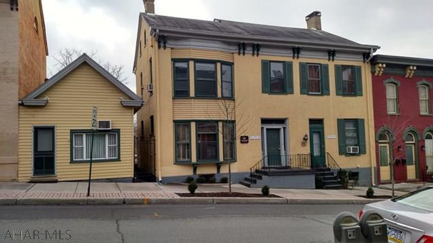 New Commercial Listing! 206-208 Allegheny Street, Historic Hollidaysburg, $250K. Two professionals had their offices, 2 half bathrooms, and a kitchen on the first floor. They lived on the 2nd and 3rd floors. There is also a tenant-occupied, 2 bedroom apartment in the rear and a small separate building that can be used for an office or retail space (now vacant). This property sits on a 1/4 acre lot with a fenced-in back yard and 3 separate garages. Call soon for your personal tour of this very unique property.