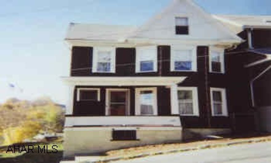 Older home with large formal dining room and eat in kitchen.   Most of the windows are newer. Great rental property!