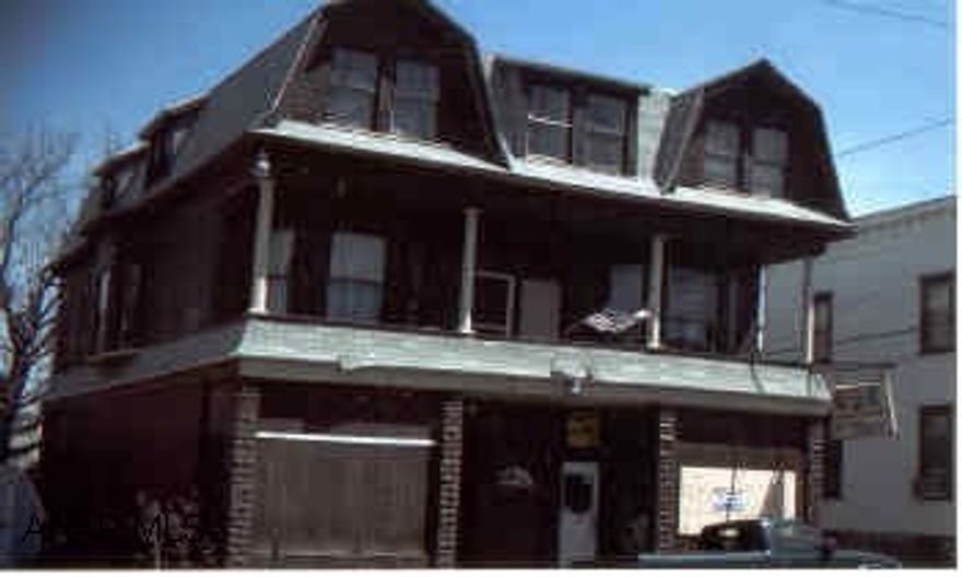 3 Units/ Store Front/  Two 3 Bedroom Apts. Grocery store vacant, needs repairs. Two 3 bedroom apts on 2nd and 3rd floors.
