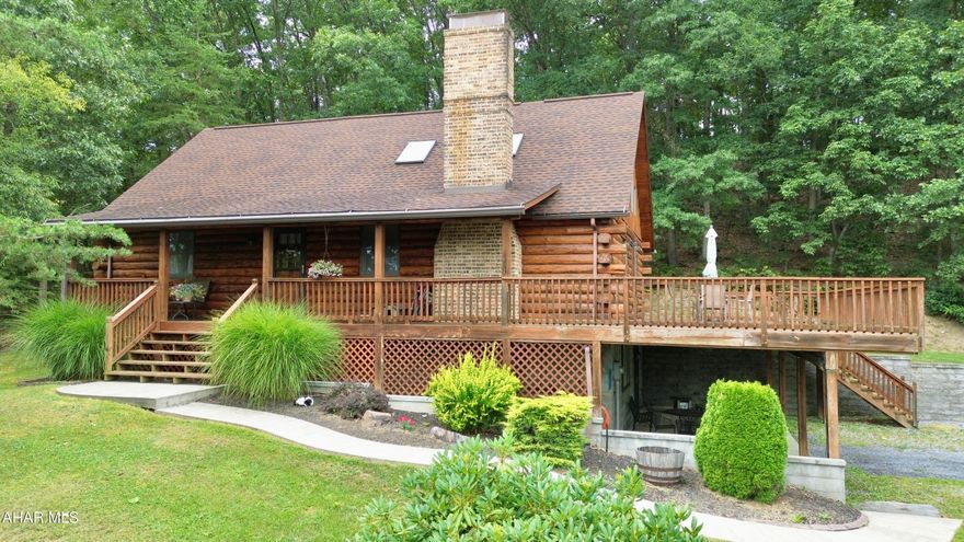 Custom-built white pine log home tucked away in a quiet country setting with easy access to I-99. This beautifully crafted 3-bedroom, 2-bath home offers an inviting floor plan with cathedral ceilings and exposed beams when you walk in the front door. On the main floor, you'll find a cozy living room with fireplace, kitchen, dining area, full bath, and bedroom. The second floor offers a second bedroom and a master suite complete with a large bathroom and a walk-in closet, providing ample space and privacy. Enjoy the outdoors with the covered front porch and a large deck, perfect for relaxing or entertaining. The oversized garage offers plenty of storage and convenience. The property offers 3.4+/- acres including an open field across the road.