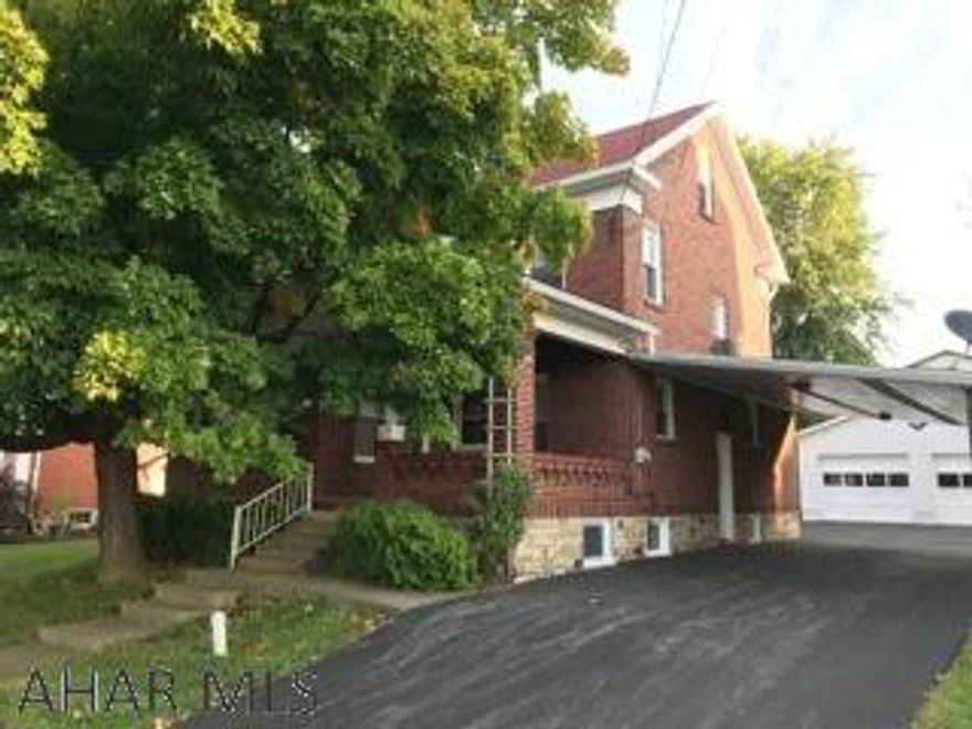 Nice 2 story brick home in the Eldorado area of Altoona. LR with brick fireplace, DR, kitchen with breakfast bar 1/2 bath & sunroom on main floor. 3 BR, full bath on second floor. Possible room in attic. Large 2 car detached garage with heat & a carport attached to house  Level lot.