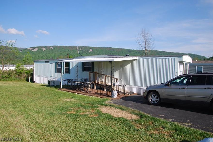 This affordable and lovely mobile home at Greendown Acres is quietly placed on 809 Kitty Lane in Duncansville, Pennsylvania. It's a spacious 12 x 70, 3 Bedroom and 1 bath mobile home that is great for anyone looking for the first time, starter home, or a very budget-friendly moderately sized living space. Lots of green space surrounds the property. Must get approval from Greendown Acres