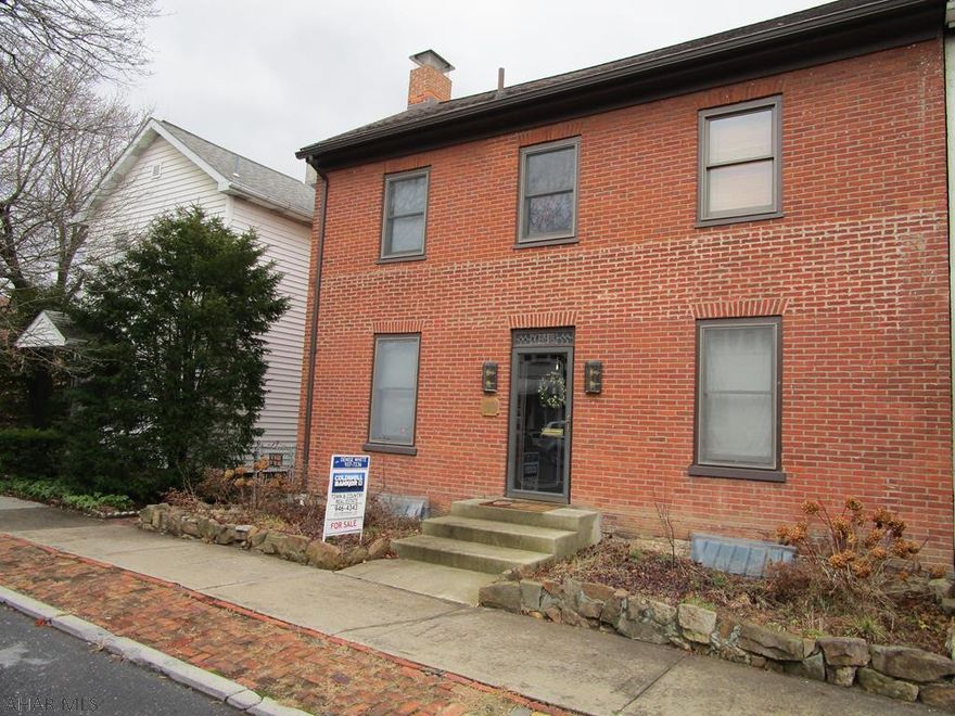 Historic Hollidaysburg 2 story brick home. 3 BR 1.5 BA. So much CHARACTER!!!  Hardwood and ceramic tile are a couple of updates to this amazing home. Covered back porch. Fenced in yard. Shed with electricity. Off street parking. Newer windows, furance, and hot water tank.(furance and hot water tank have warranties)  Walking distance to schools and shopping. This is a MUST SEE!