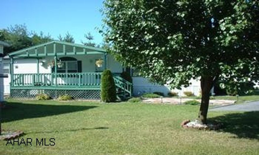 3 BR HOME FEATURING CATHEDRAL CEILINGS AND WALK IN CLOSETS. EAT IN KITCHEN, LR, DR, LAUNDRY ROOM, 2 BA INCLUDING MASTER BA.ENORMOUS COVERED PORCH,CEILING FANS,GAS FORCED AIR HEAT,CENTRAL AIR,GAS FIREPLACE IN LR.CALL  WONDERFUL FLOOR PLAN IN THIS SPOTLESS 3 BR HOME. INVITING CORNER GAS FIREPLACE IN LIVING ROOM. MUST SEE! LOT RENT IS $368 INCLUDES WATER, SEWER, TRASH AND SNOW REMOVAL.