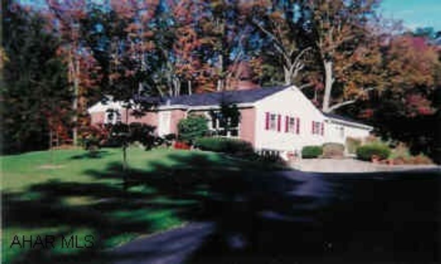 Attractive, comfortable single-story home in perfect setting. 1.9 Acre lot with great view. Newly remodeled bathroom w/heated floor, comfortable, homey Family Room, Fireplace in Living Room, attractive landscaping.