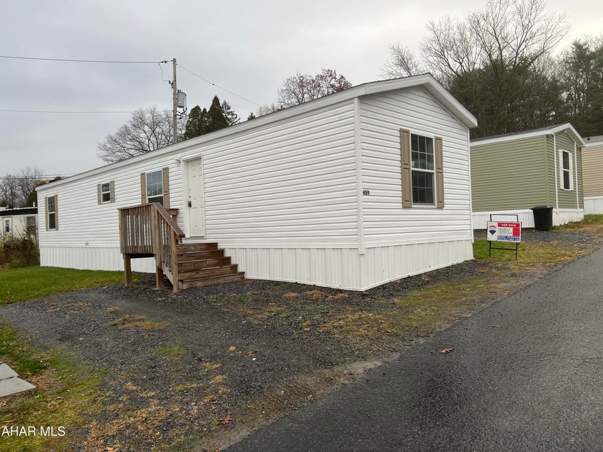 2 year old mobile home, almost new, off street parking, friendly neighborhood.  Water and sewer - $82.03. Lot rent and water/sewer average per month - $500.
