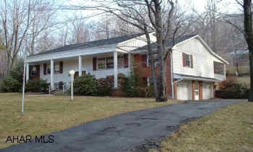 QUALITY CONSTRUCTION 4 BEDROOM HOME NESTLED AMONG MATURE TREES ON 1.3 ACRES. ONE AND ONE HALF MILES FROM THE ALTOONA CAMPUS. THIS HOME FEATURES SLATE AND HARDWOOD FLOORS, A LARGE EAT-IN KITCHEN AND A LARGE COVERED PATIO.