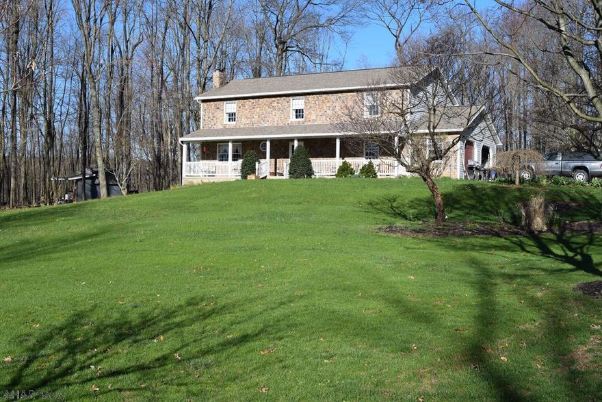 A beautiful Northern Bedford County quality custom built home in a peaceful, rural setting on 5.67 acres which can be subdivided.  Standing timber value.  Newer Mitsubishi and York heat pump and central air system with optional baseboard hot water heat.  Spacious, open concept kitchen and dining area, 4 large bedrooms with additional room useful for an office, sewing room or nursery. Two full baths with laundry off the kitchen with bathroom facility. Central vacuum, central air and 2-car attached garage.  Close to Routes 36, I99 and state game lands. A MUST SEE!  PRICED TO SELL!  Seller would consider a limited article of agreement.
