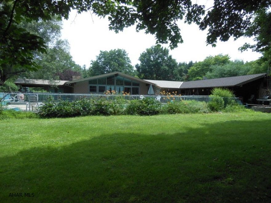 Wonderful sprawling Ranch home with over 3,000 sq. ft. of living space on main level. Lots of natural light, cathedral ceilings. Great pool house and covered patio w/ bath, changing room and kitchen area. Privacy at its best and terrific home for entertaining! 22x40 in ground heated pool add for summer fun!