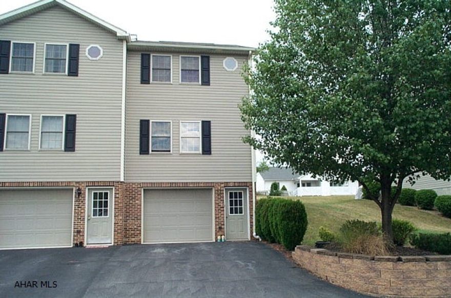 Hollidaysburg/Penn Farms townhouse with 2br/1.5bath.End unit built in 2003 with main floor laundry.Eat in kitchen with all appliances staying leads to private rear deck and yard behind.Large master bedroom, mountian view from living room. Ready to move in! Seller will entertain reasonable offers!