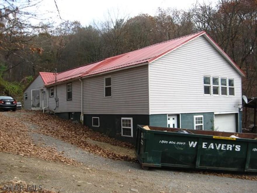 This home is in need of repairs and TLC but has lots of potential and is offered in as is/where is condition.  Some upgrades have been done:  a newer metal roof, furnace and central air conditioning.