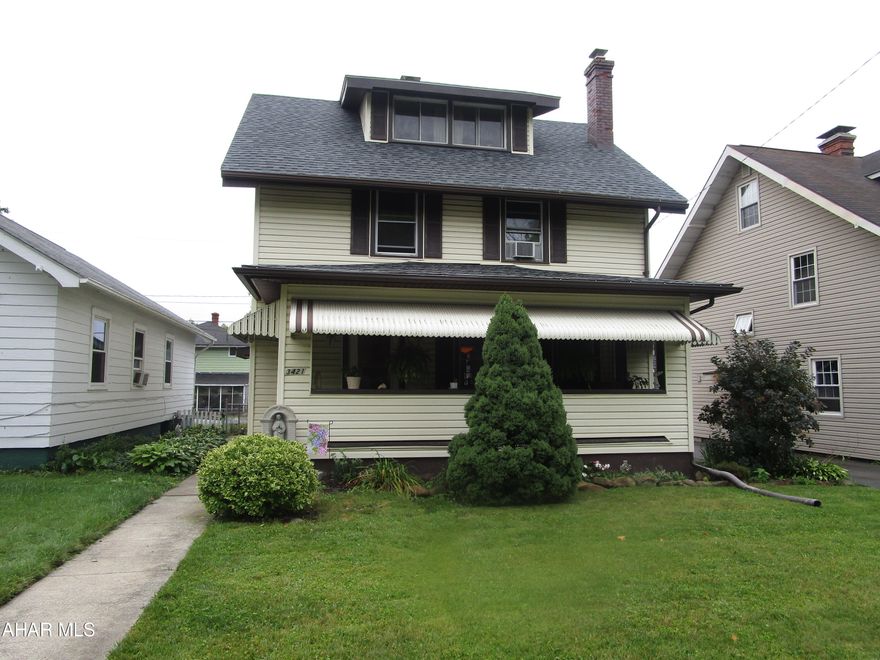 Wonderful family home on level lot features 3-4 bedrooms, formal dining room and covered rear patio.  Large living room with built in bookcases on either side of woodburning fireplace,
Driveway is shared, off street parking in front and rear of the home.   Cozy covered front porch to enjoy the coming fall colors and cooler evenings.  Updated electrical panel, and newer water heater.  Finished attic for fourth bedroom, or office.   Family room in basement.   Fireplace has not been used in several years.