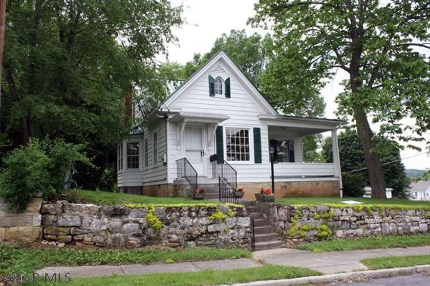 This home has been pristinely maintained and well care for!! Located in Historic Bedford Borough just seconds away from shops and restaurants.  The first level offers a living room with oak floors, kitchen with eat-in area, dining room with oak floors, two bedrooms with pine board floors and a full bath.  Second level has two bedrooms with pine floors and a half bath.  Full unfinished basement, gas hot water furnace, central air conditioning and 200-amp electric.  Cozy covered porch, hand cut stone retaining wall and off-street parking.