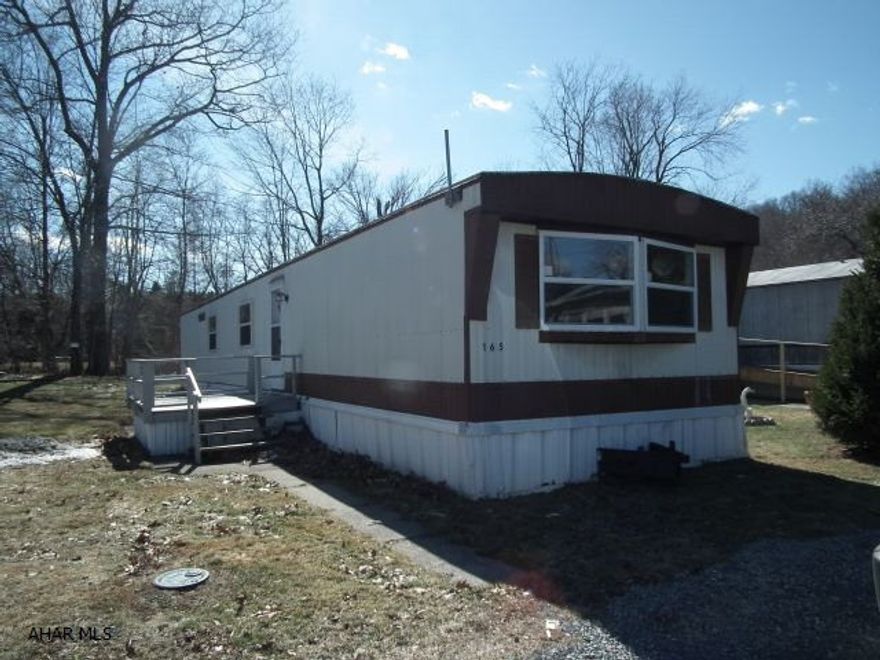 Needs TLC outside-Completely remodeled inside! New modern kitchen with eat in area, Bedroom with 1/2 Bath, Large living room-freshly painted + new carpeting-Updated full bath, nice size 2nd bedroom, lg 3rd Bedroom with laundry hook-up.