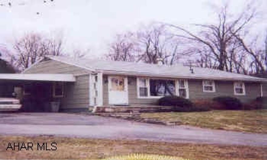 GREAT OPPORTUNITY! SPACIOUS LOT 148X192, NICE SETTING. UPDATED ROOF, PAVED DRIVEWAY. GAS HEAT. 100 AMP SERVICE.