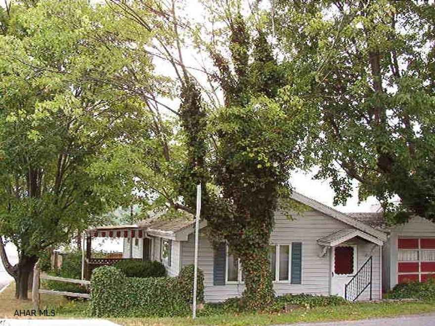 Great Business location!  Currently used as Residential Rental, but is zoned as business.  Property offers Kitchen, Dining Room, Living Room, Office/Den, 1 Bedroom, 1 Bathroom, 1 Car Detached Garage and Finished Partial Basement.