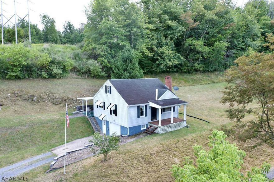 Quaint home in the Hollidaysburg Area School District! This home sits on approx. 1.79 acres in a convenient location just steps from Chimney Rocks Park. This home offers 3 beds, 1 bath, an integral garage, and a large shed. Sit on either the front or back porch and enjoy the view of downtown Hollidaysburg. With a little TLC, make this your perfect home! Seller will give $7,500 credit with full price offer for roof repair/replacement.