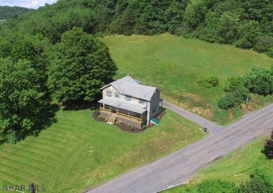 Country living at it's finest yet close to town. 2 story home on 4.445 acres. 3 bedroom, 1 bath with new flooring throughout. Gorgeous Hickory hardwoods on first floor and wormy red oak hardwoods in all 3 bedrooms. A must see. Updated electric, updated bathroom and new spacious front porch that is so inviting. Sit back and enjoy the peace and quiet!