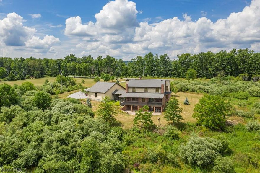 Custom-built brick 3 bedroom, 3 bathroom home on 3.6+ acres adjacent to 7,651 acres of State Game Lands (SGL120). Enjoy breathtaking mountain views from the deck. Store all the toys in the oversized two car garage. Relax in the open concept great room with rustic hickory beams and brick accent. Finish the walkout basement for more living space. The possibilities are endless with this immaculate, well-maintained home that has barely been lived in. A secluded setting but also close to local amenities and Rock Run Recreation Area with over 140 miles of trails and also Prince Gallitzin State Park containing 1,635 acre Lake Glendale. A 1.37 acre subdivision possible. City water. Don't miss this one. Check out our 3D virtual tour and property video.