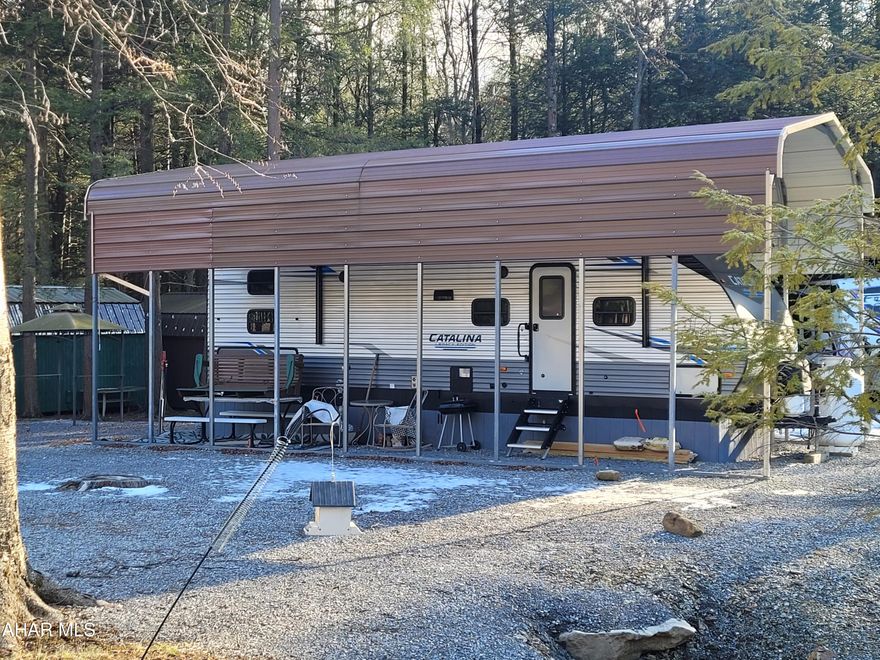 101 Brandy Circle offers a roomy campsite with space for parking your boat or visitors.  The newer camper has two bedrooms that sleeps up to six people in the bedrooms with room for guests in the living space.  Very nice condition.  Shed for your toys and tools.