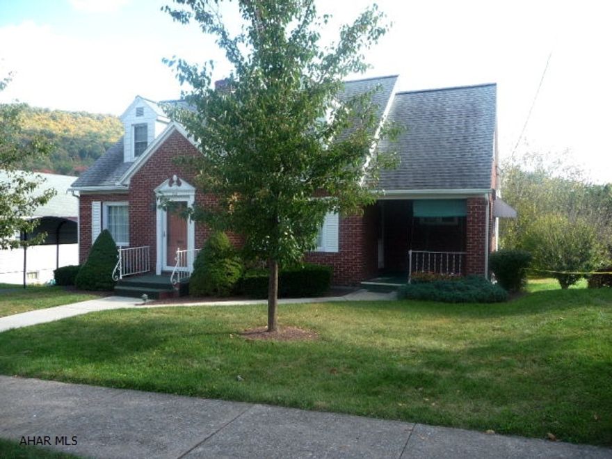 Charming 3 BR brick Cape Cod in convenient, in-town location close to schools, library and shopping. This beautiful home includes a large living room w/ wood burning fireplace, dining room, and a modern eat-in kitchen. It also offers main level master bedroom, a second bedroom and full bath. The second floor offers a large bedroom, bonus room and a half bath. The (walkout)basement is partially finished and includes a half bath and laundry area. The exterior includes a nice covered front porch, small rear deck, carport and spacious rear yard.