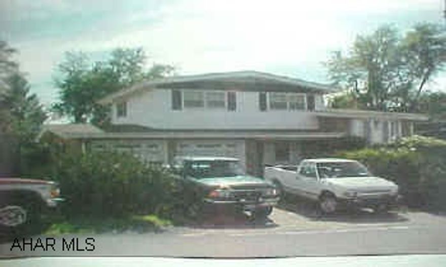 Very well built home across from the Post Office in Blandburg. Construction is brick/masonite. Wet bar in family rm. Kitchen has ceramic counter tops. Lot w/BBQ pit, covered back porch. 2-car attached & 2-car detached garages. Lot dimensions: 80x150 & 25x Very well built home across from the Post Office in Blandburg. Construction is brick/masonite. Wet bar in family rm. Kitchen has ceramic counter tops. Lot w/BBQ pit, covered back porch. 2-car attached & 2-car detached garages. Lot dimensions: 80x150 & 25x158.