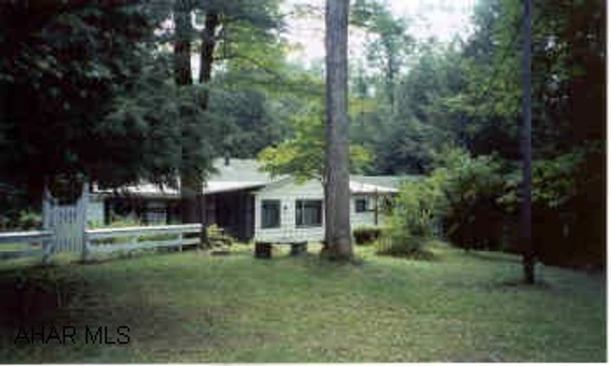 Nice hunting camp on 5.5 acres, borders state game lands.  See listing agents to show.