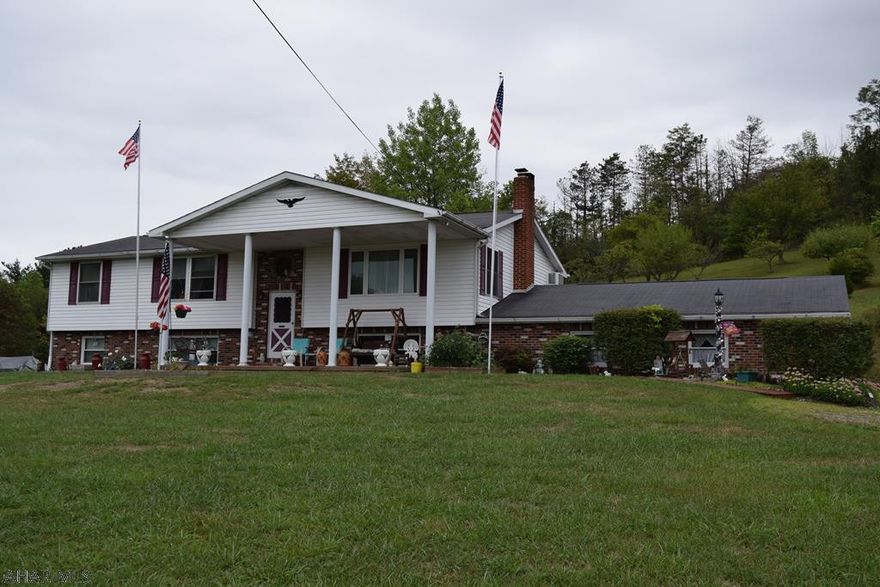 This 5 bedroom split entry home is situated on 12.87 acres with great views. Updated kitchen, newer windows, 2 car attached garage and two heating sources. Enjoy the wildlife that comes in to feed on numerous apple trees, grape vines and blueberry bushes. The upper field can be used for farming or a variety of livestock. Call me today to schedule your showing.