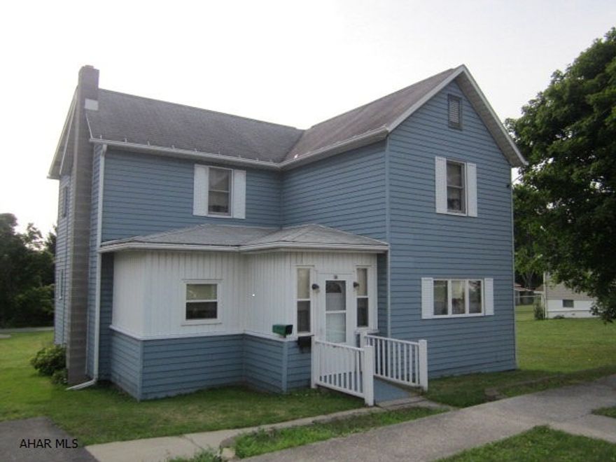 Nice large home with double lot.