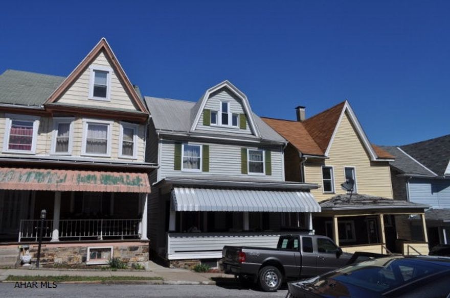 Nice location for this 2.5 story 2 full baths 4 bedroom vinyl sided home with replacement windows, fenced yard