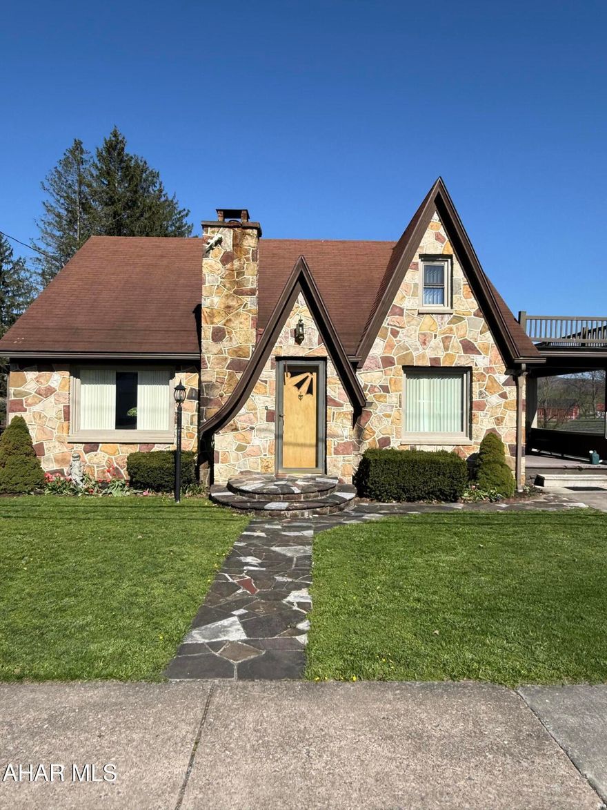 Welcome to 3987 Cortland Drive! This exquisite stone home is located within the Chestnut Ridge School District. The expansive backyard is ideal for entertaining featuring a large garden and a stream at the edge, perfect for fishing or skipping rocks. A spacious side porch entrance provides a comfortable space to relax and unwind. Inside, the eat-in kitchen includes a sit-up bar, a desk area, and ample counter space. The refrigerator, range/oven, microwave and dishwasher are included. The also offers a pantry and abundant cabinet storage, accompanied by a dining area. Adjacent to the kitchen is a versatile den, suitable for use as a playroom, gym, or additional living area. The first-floor master bedroom features a full bathroom and double closets. The expansive living room is bathed in natural light. On the second floor, there are two bedrooms, a half bath, and a cedar closet. The basement includes wash tubs, a washer, dryer, walkout access, and generous storage space. Convenient situated near medical offices, schools, and local shops, this property is just minutes from Shawnee State Park and close to Blue Knob State Park. Make this yours today!!