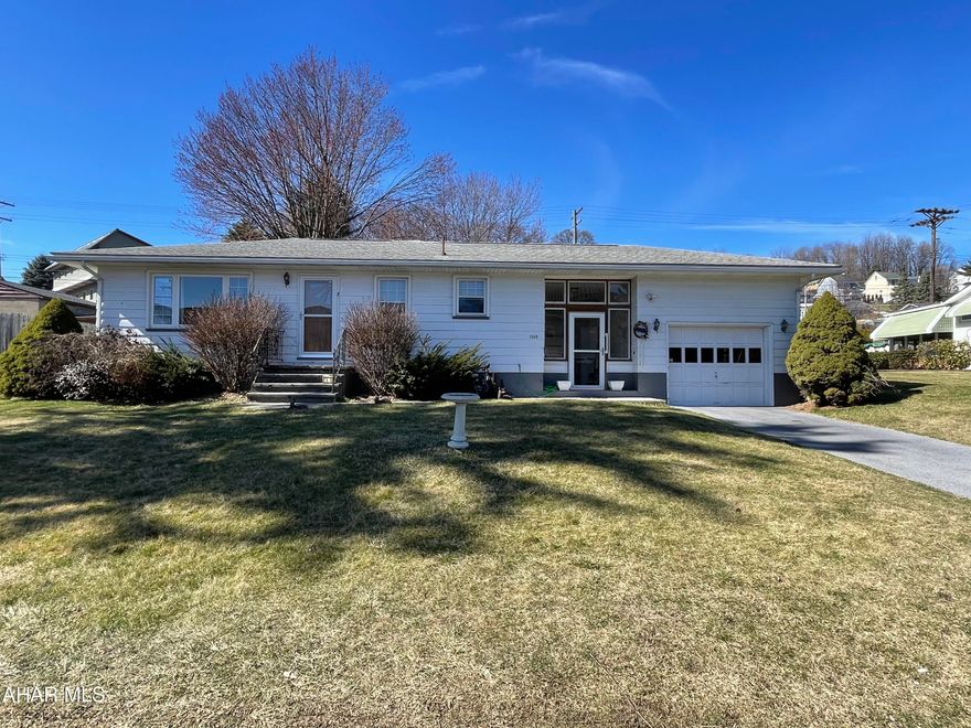 This well maintained 2 bedroom 1.5 bath ranch house features a spacious yard for gardening and a massive three seasons room for relaxing or entertaining family and friends.  On the first floor you will find hardwood floors, plaster walls and beautiful natural lighting.  The kitchen has oak cabinets and is open to the living room.  Both bedrooms have nice closets and the full bath is between them. Downstairs you will find a spacious finished family room with attached kitchen a half bath and the utility/laundry room.  The one car garage has additional storage.