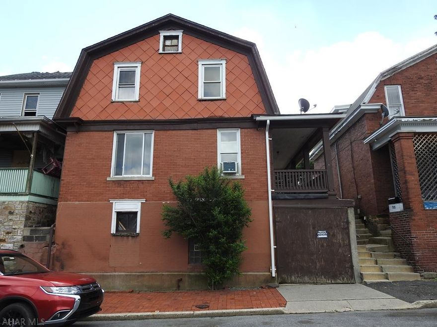 This could be a great first home that's close to schools, library, UPMC Station Medical Center, shopping and I99.  Current owner made many improvements, including carpeting, updated 1/2 bath, new stove, new water heater, and roof is less than 10 yrs. old. Great house for the money!