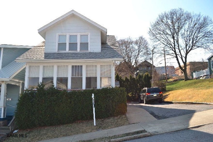 If you are looking in this price range, THIS IS YOUR HOUSE!  This 3 BR, 2 BA home can be moved right into with the peace of mind of knowing it has been well taken care of. Brand new roof this past fall (2013) & new hot water heater, updated electric panel, & near-new furnace (2010).  First floor has enclosed porch, nice sized living room & dining room, a newly updated kitchen with appls that stay, and a sweet sunroom/family room addition in the back that includes 1st floor laundry & a bath.  Backyard will be perfect once the weather breaks with a patio & fenced yard.  All this sitting on a double lot with off-street parking!