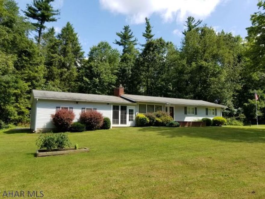 Nice 3 bedroom rancher with 2 car attached garage on 1/2 acre near Warriors Mark. Brick fireplace in living room. Breezeway.